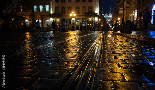 Lviv, Ukraine - November 28, 2020: Lviv Market square at night in rain