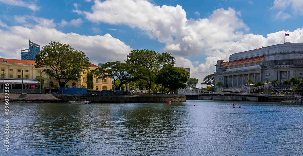A view across a basin on the Singapore river towards the Elgin Bridge in Singapore, Asia