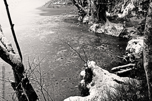 Small melt water induced craters in frozen Longemer lake cover. Vosges, France.