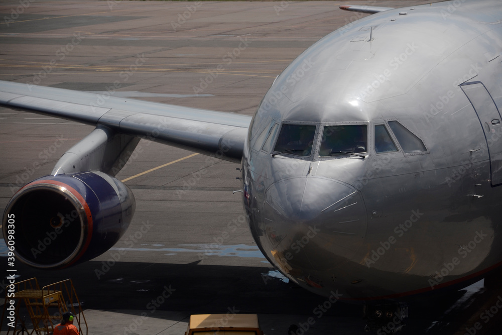 plane at the airport, passenger plane plane at the airport, passenger plane