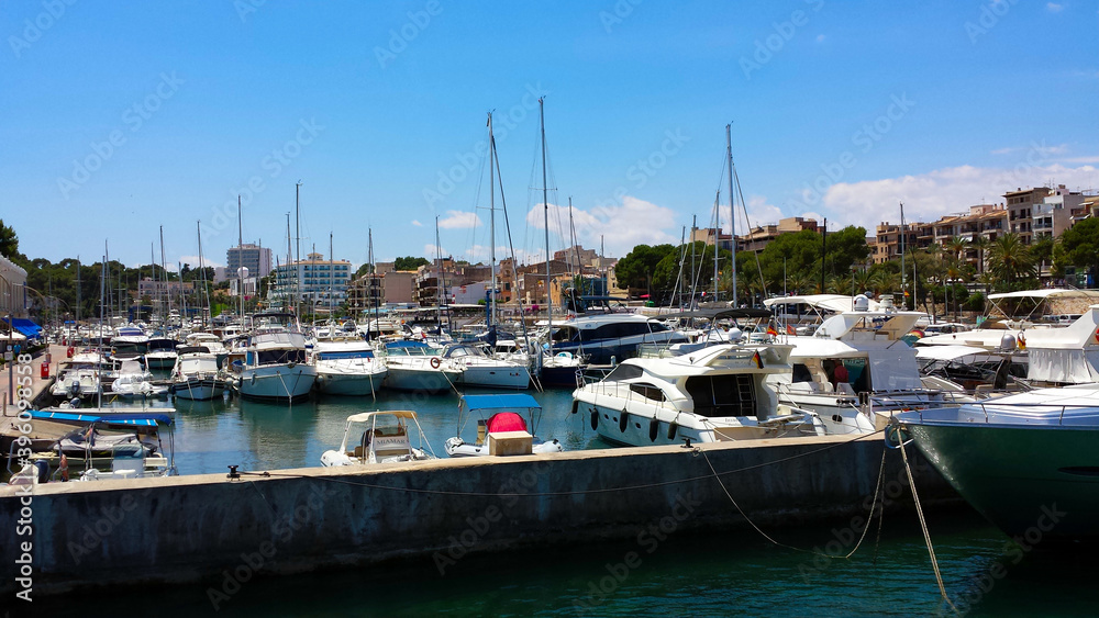 Boats and yachts docked at Porto Cristo harbour, Mallorca, Spain