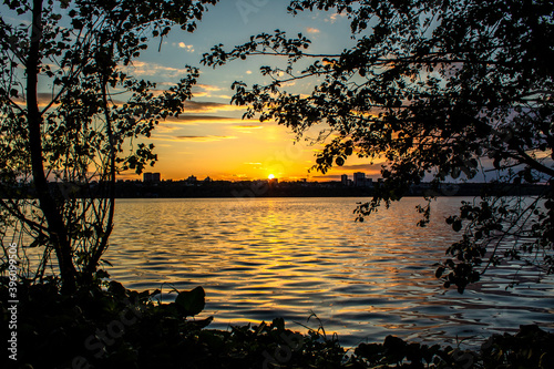  beautiful sunset by the river, the sky against the setting sun © Светлана Новикова