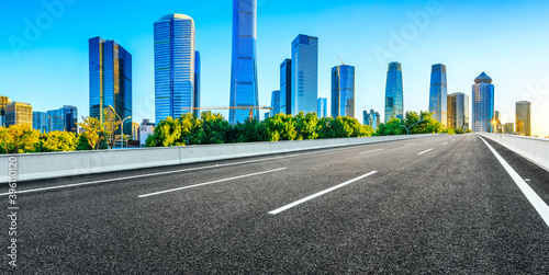 Empty asphalt road and modern cityscape in Beijing China.