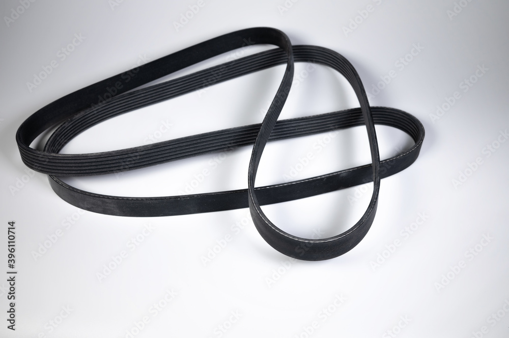 Wide poly-V bypass belt for internal combustion engine attachments. New spare alternator belt Wide poly-V bypass belt for internal combustion engine attachments. New spare alternator belt
