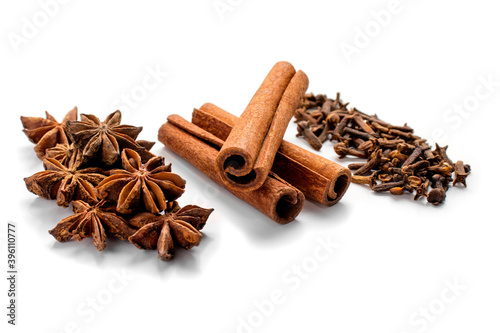 Wallpaper Mural Cinnamon sticks and star anise, cloves isolated on white background close-up. Spices for Christmas mulled wine or grog Torontodigital.ca