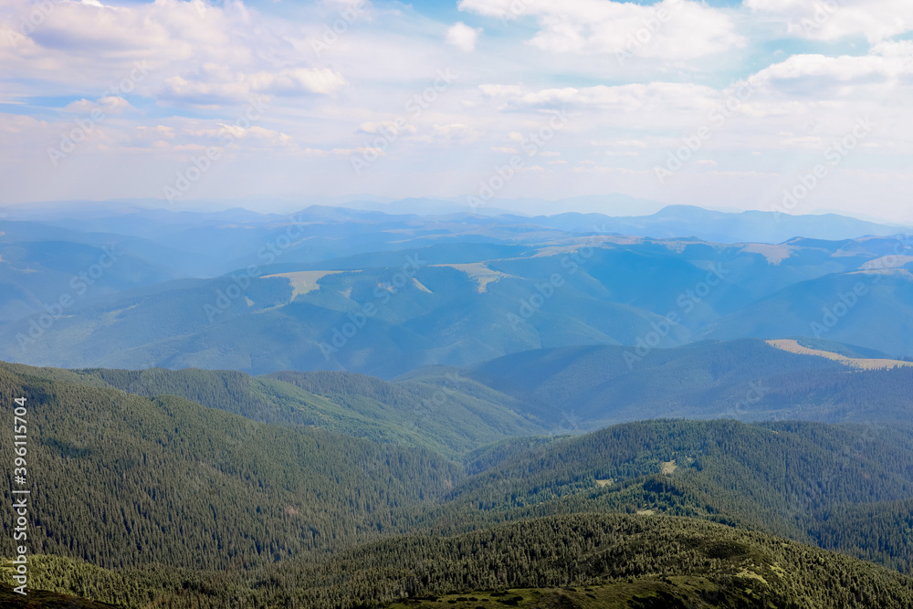 Fototapeta premium Carpathians mountain range at summer morning. Beauty of wild virgin Ukrainian nature. Peacefulness.