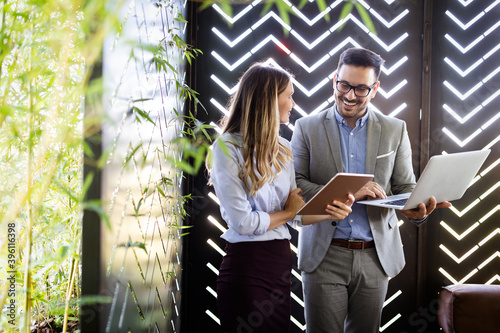 Two business colleagues at meeting in modern office interior