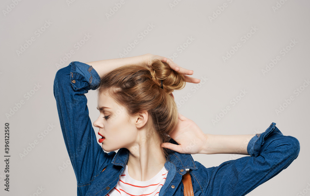pretty woman holding hands behind head emotions decoration cropped view gray background pretty woman holding hands behind head emotions decoration cropped view gray background