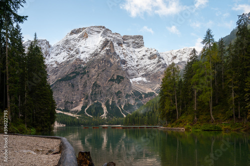 View of Mount Seekofel mirroring in the clear calm water of iconic mountain lake Pragser Wildsee (Lago di Braies) in Italy, Dolomites, Unesco World Heritage, South Tyrol