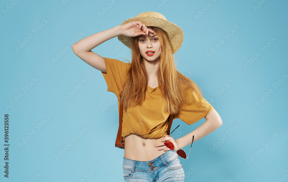 Woman trendy youth clothes with backpack blue background Woman trendy youth clothes with backpack blue background