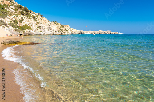 Obraz na płótnie crystal clear water on Tsambika beach in Rhodes island Greece w salonie