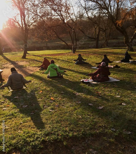 People do yoga in Loshitsky Park