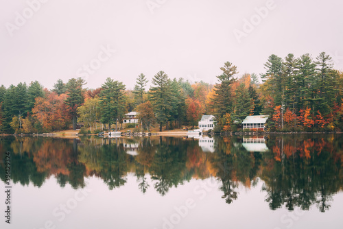 Wilson Lake with autumn color, in Wilton, Maine photo