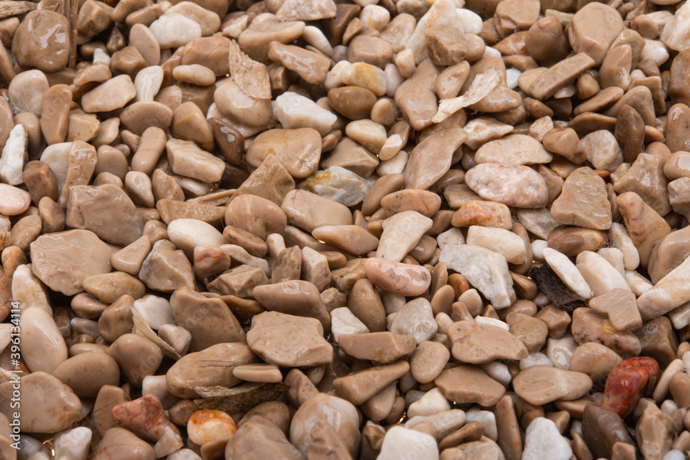 background of small pebbles close up background of small pebbles close up