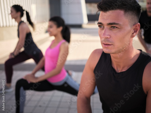 Young caucasian male athlete during lunges exercise