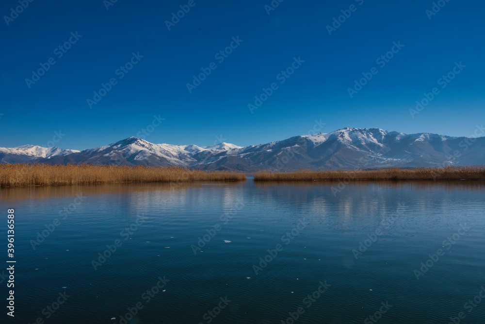 Obraz premium Amazing view to mountains of Alvania from Prespes lakes