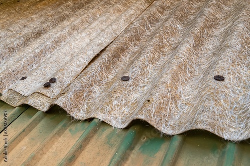 old fiberglass and metal corrugated roofing
