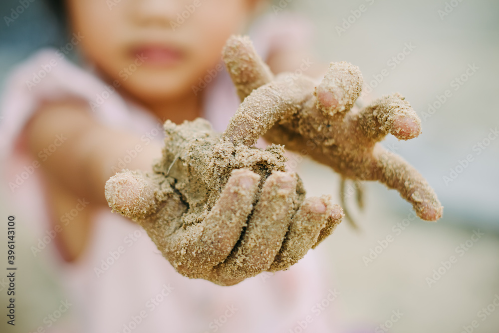 Kids playing in the sands. This activity is good for sensory experience