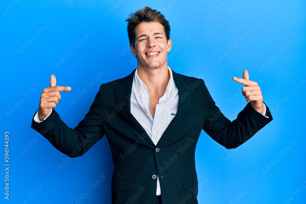 Handsome caucasian man wearing business suit and tie looking confident with smile on face, pointing oneself with fingers proud and happy. Handsome caucasian man wearing business suit and tie looking confident with smile on face, pointing oneself with fingers proud and happy.