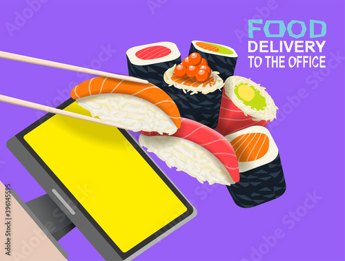 Food delivery to the office. Sushi and rolls ordered via a web site on a computer