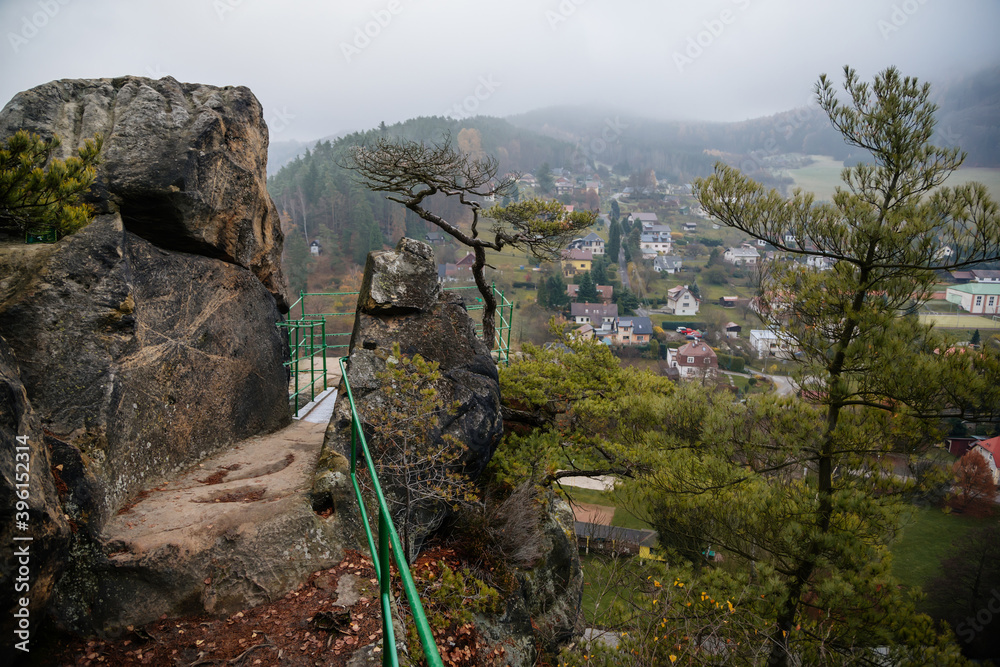 Viewpoint above Jizera valley near castle Vranov, Iron green ladder to the top of the sandstone rocks, Hiking Golden Trail of Bohemian Paradise, Mala Skala, Czech Republic