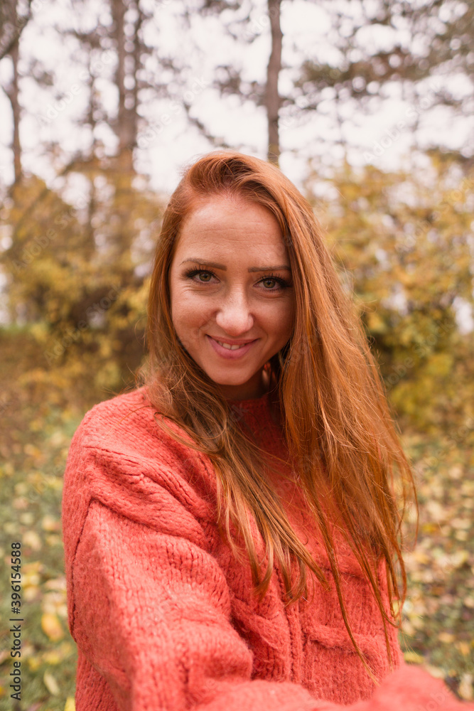 portrait of a woman in autumn park portrait of a woman in autumn park