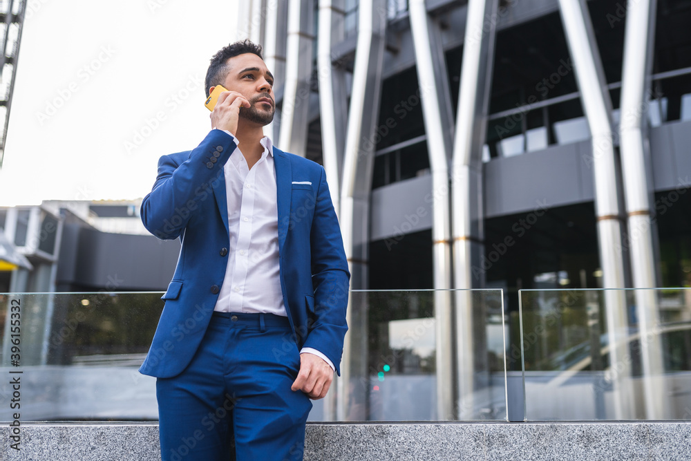 Businessman Having Phone Call Outdoors. Businessman Having Phone Call Outdoors.