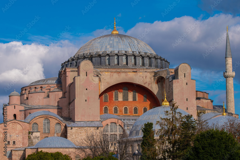 historical Hagia Sophia mosque, museum, church in Istanbul. place of worship, muslim and christian place of worship, blue sky and white clouds
