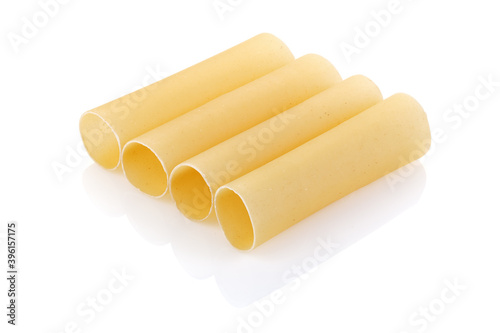 Italian pasta for tubes cannelloni. Close-up of a of raw cannelloni pasta  a tubular pasta that is usually stuffed with meat or vegetables  on a white background. Full depth of field.