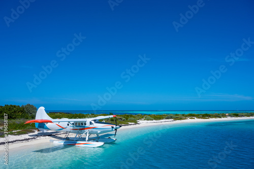 Fototapeta Naklejka Na Ścianę i Meble -  Sea Plane Docked at Dry Tortugas Beach