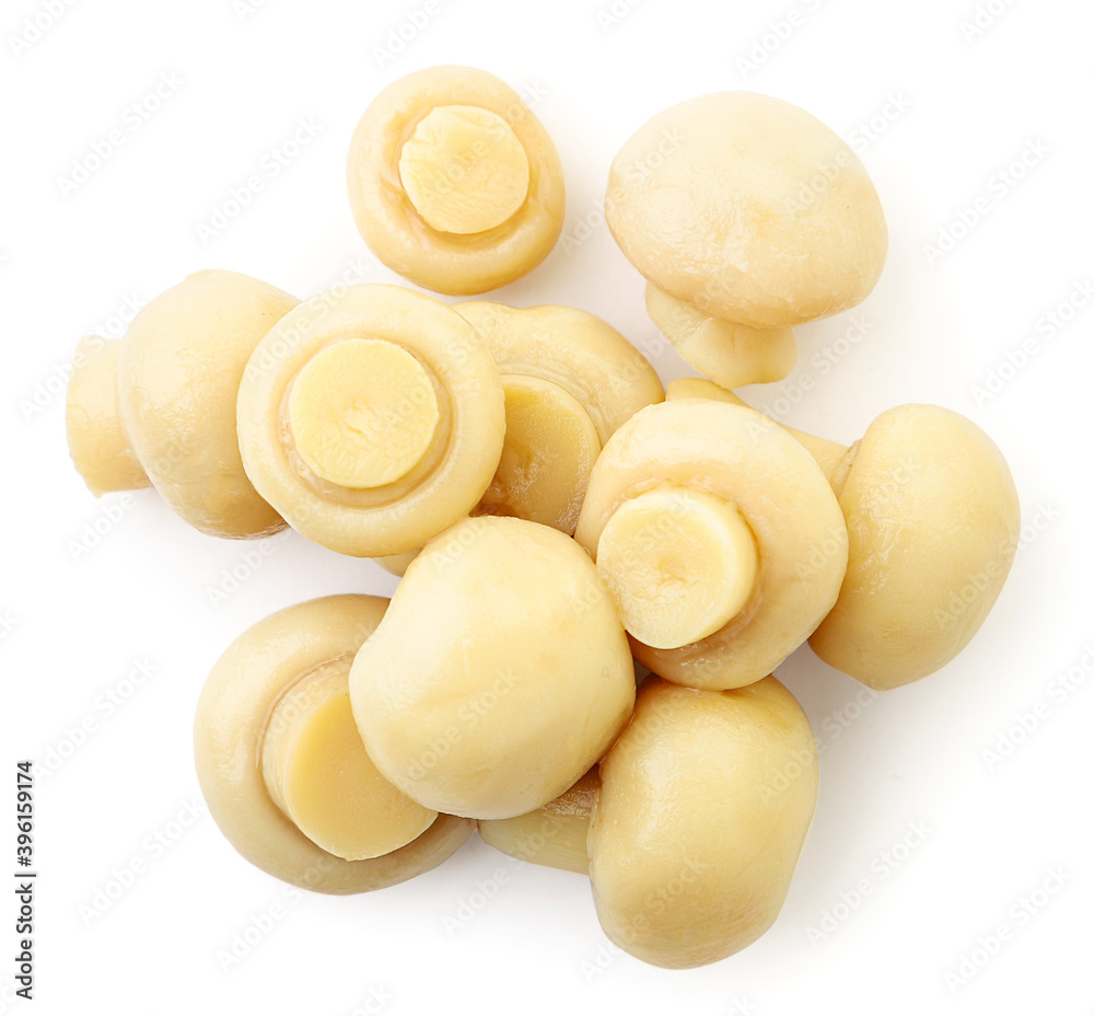Canned champignons on a white background, isolated. The view from top Canned champignons on a white background, isolated. The view from top