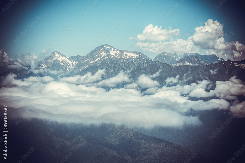 Beautiful mountain landscape with sky and clouds at Caucasus mountains