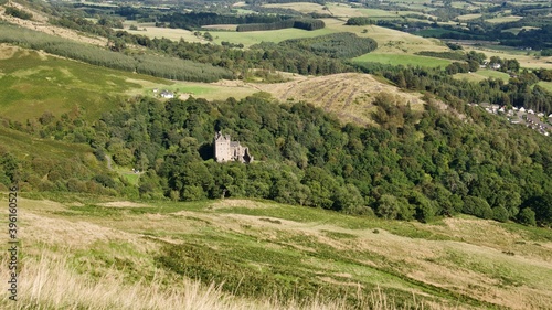 Scenic view of Castle Campbell from the top of a hill
