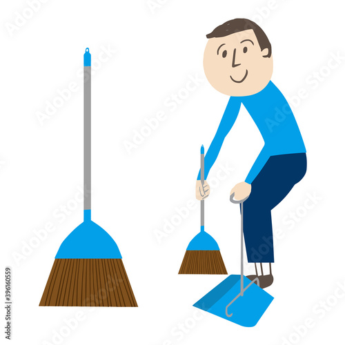 A man who cleans while removing dust with  a broom and dustpan