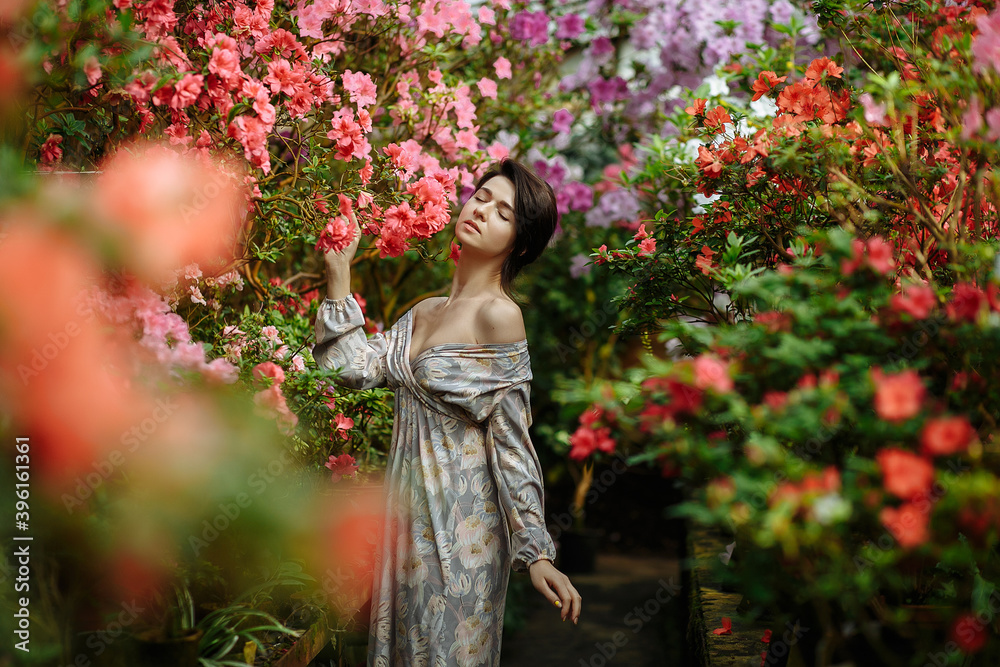 dreamy girl in a big flower garden dreamy girl in a big flower garden