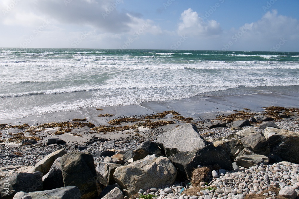 Rocky beach next to a wild ocean on a sunny summer day in the Outer Hebrides Rocky beach next to a wild ocean on a sunny summer day in the Outer Hebrides
