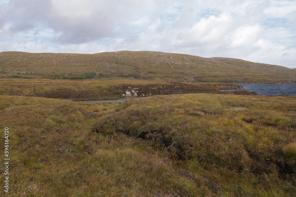 Brown wild scenery of a peatland on the Island of South Uist, Outer Hebrides