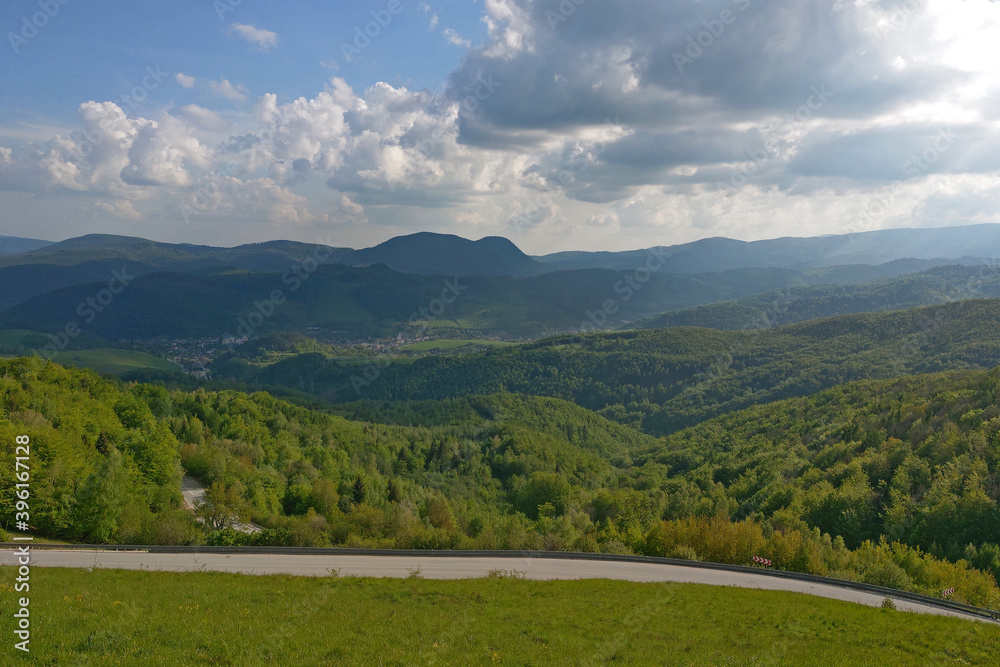 Landscape with curvy road at summer sunset. Landscape with curvy road at summer sunset.