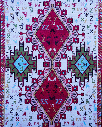 Colorful Handmade traditional meadle east Persian carpet in Antalya, Turkey photo