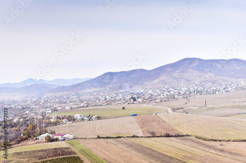 View from Kveshi fortress to Mushevani village in Georgia. Traditional remote Countryside villages in Caucasus.