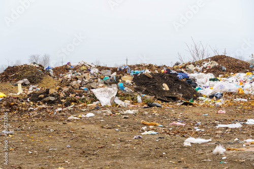 Landfill, mountains of garbage are collected in one place.