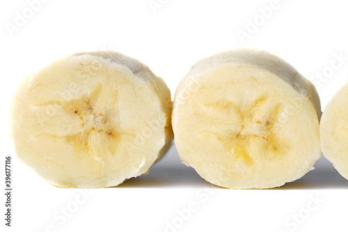 Sliced banana slices on a white background close-up