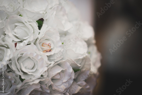 white wedding bouquet with rings