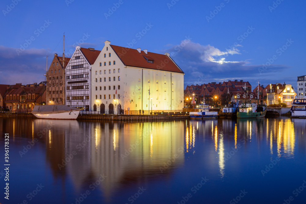 Motlawa River and beautiful architecture of Gdansk at night. Poland