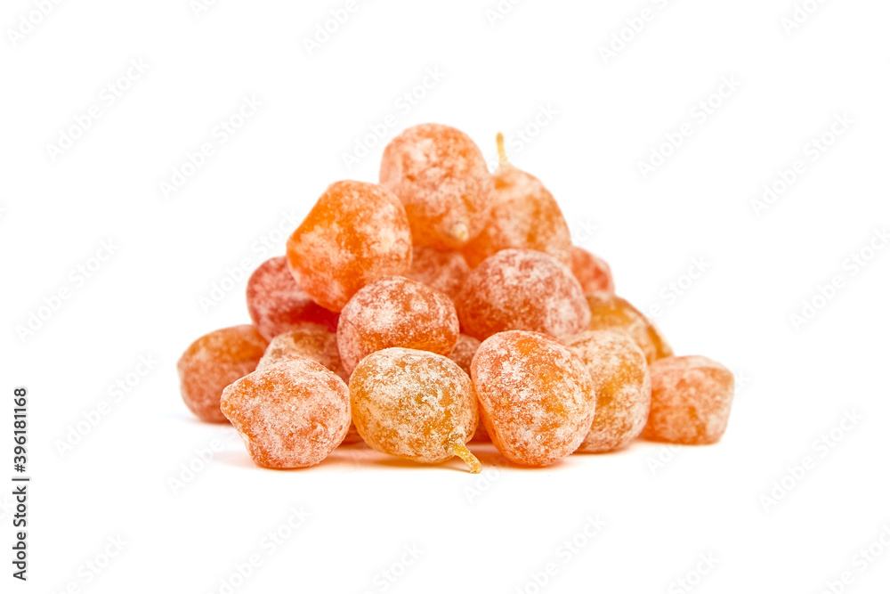 Candied kumquats, heap of dried fruits isolated on white background Candied kumquats, heap of dried fruits isolated on white background