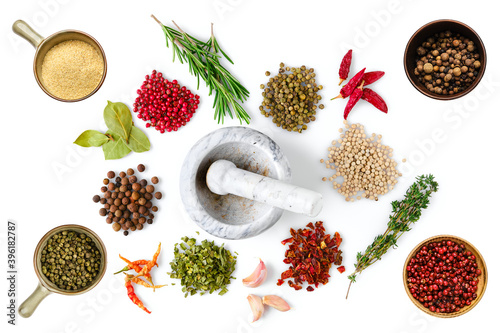Fototapeta Naklejka Na Ścianę i Meble -  Various spice and herbs scattered on white background
