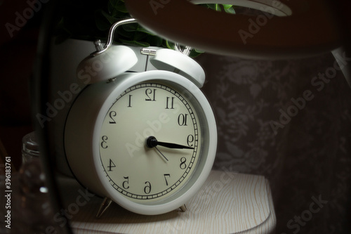 old alarm clock on the table