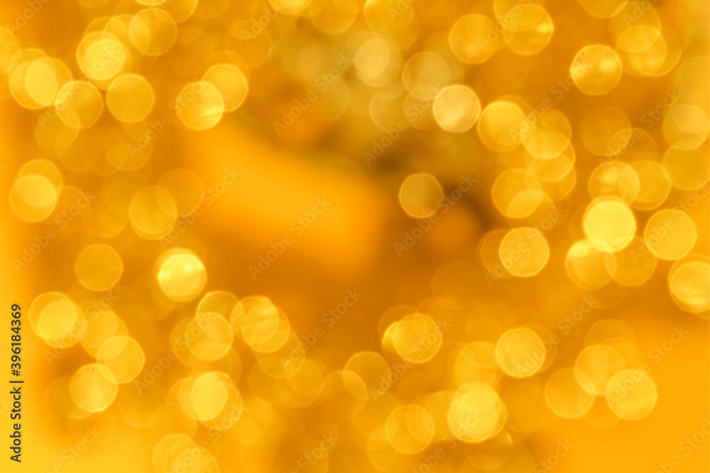 Curly golden bokeh as a trending backdrop. Bokeh in color: set sail champagne, fortuna gold, marigold, illuminating Curly golden bokeh as a trending backdrop. Bokeh in color: set sail champagne, fortuna gold, marigold, illuminating