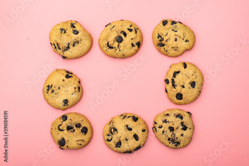 Wallpaper Mural Cookies with chocolate on a pink background. Sweet background. Torontodigital.ca