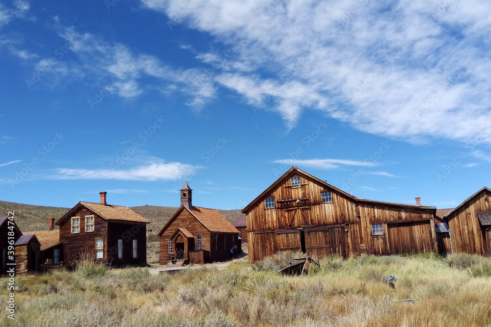 Empty streets of the abandoned ghost town of Bodie in California, USA in the middle of the day. Empty streets of the abandoned ghost town of Bodie in California, USA in the middle of the day.